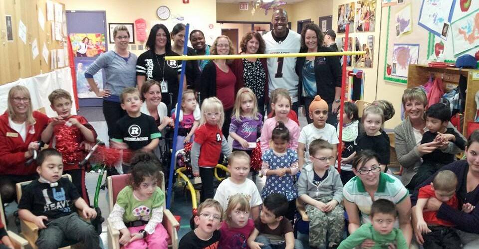 Photo of students and Henry Burris during an OCTC visit