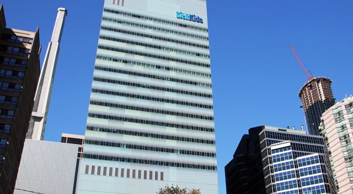 A tall SickKids building with 230 labs