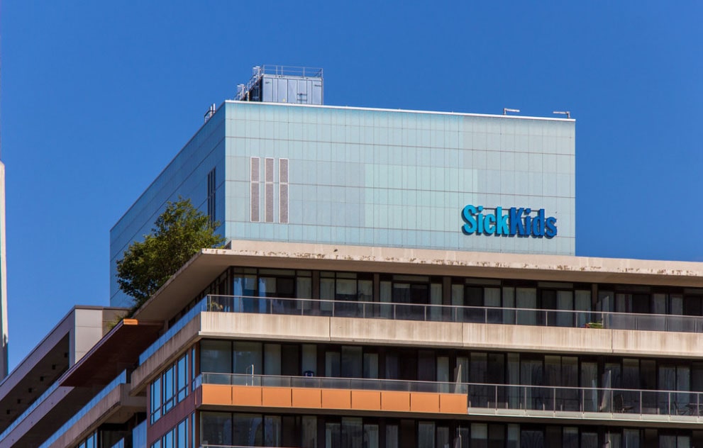 SickKids building stands behind the other structur